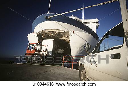 Cargo being loaded onto ferry Port Melbourne Victoria Australia View Large Photo Image Stock Photograph - Cargo being loaded onto ferry Port Melbourne Victoria Australia. Fotosearch
