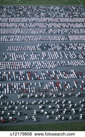 Cars and trucks parked in carpark view from above View Large Photo Image Stock Photo - Cars and trucks parked in carpark view from above. Fotosearch