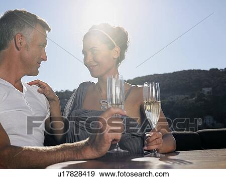 Couple Drinking Champaign on Boat View Large Photo Image Stock Photo - Couple Drinking Champaign on Boat. Fotosearch