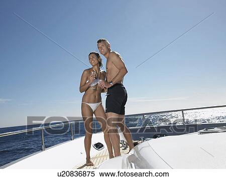 Couple Drinking Champaign on Boat View Large Photo Image Stock Photography - Couple Drinking Champaign on Boat. Fotosearch