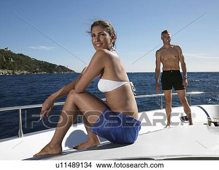 Couple on a Boat View Large Photo Image Picture - Couple on a Boat. Fotosearch