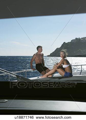 Stock Photograph - Couple on a Boat. Fotosearch