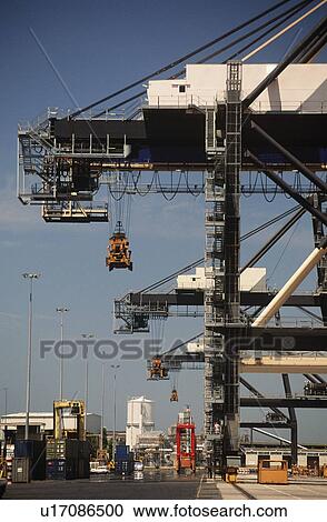 Stock Image - Cranes on container dock. Fotosearch