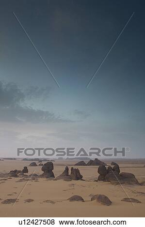 Desert landscape with boulders View Large Photo Image Stock Photo - Desert landscape with boulders. Fotosearch