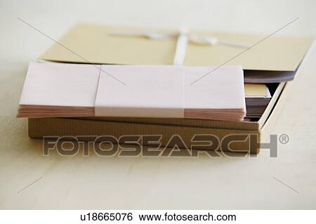 Envelopes and paper stationery elevated view studio shot View Large Photo Image Stock Photograph - Envelopes and paper stationery elevated view studio shot. Fotosearch