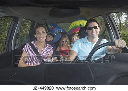 Family with three children (5-11) in car interior portrait View Large Photo Image Stock Image - Family with three children (5-11) in car interior portrait. Fotosearch