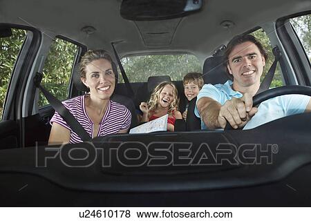 Family with two children (5-6) in car interior portrait View Large Photo Image Stock Photo - Family with two children (5-6) in car interior portrait. Fotosearch
