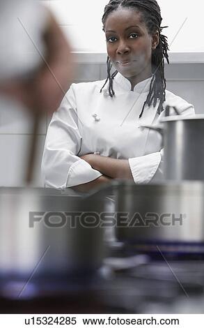 Female chef in kitchen portrait View Large Photo Image Stock Photography - Female chef in kitchen portrait. Fotosearch
