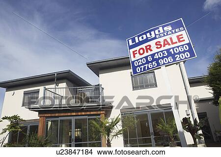 For sale sign outside house View Large Photo Image Picture - For sale sign outside house. Fotosearch