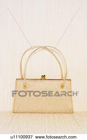 Gold purse View Large Photo Image Stock Photo - Gold purse. Fotosearch