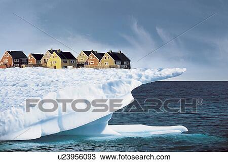 Stock Image - Houses on Edge of Ice Cliff. Fotosearch