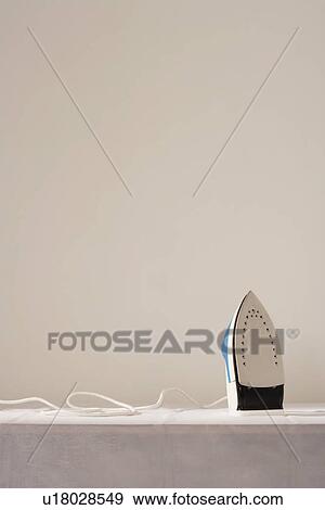 Iron on table View Large Photo Image Stock Photo - Iron on table. Fotosearch