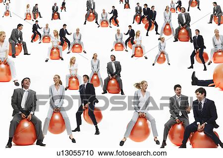Large group of business people bouncing on inflatable balls studio shot View Large Photo Image Stock Image - Large group of business people bouncing on inflatable balls studio shot. Fotosearch
