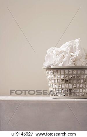 Stock Photo - Laundry basket on table. Fotosearch