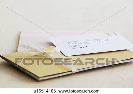 Letter and paper stationery elevated view close up studio shot View Large Photo Image Stock Photography - Letter and paper stationery elevated view close up studio shot. Fotosearch