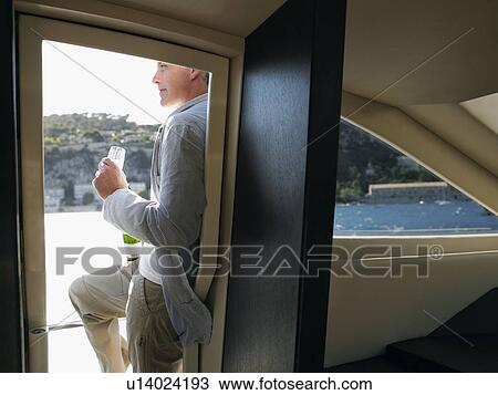 Man Drinking Champaign on Yacht View Large Photo Image Stock Image - Man Drinking Champaign on Yacht. Fotosearch