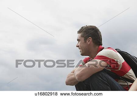 Man outdoors side view View Large Photo Image Stock Photo - Man outdoors side view. Fotosearch