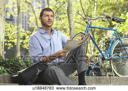 Man relaxing in park View Large Photo Image Stock Image - Man relaxing in park. Fotosearch
