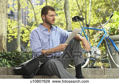 Man relaxing in park View Large Photo Image Stock Photo - Man relaxing in park. Fotosearch