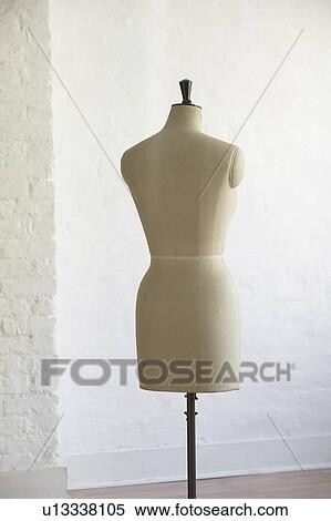 Stock Photography - Mannequin indoors back view. Fotosearch