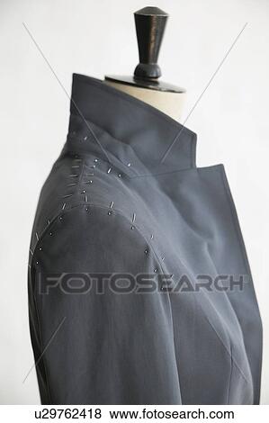 Mannequin with unfinished jacket close up side view View Large Photo Image Stock Photo - Mannequin with unfinished jacket close up side view. Fotosearch