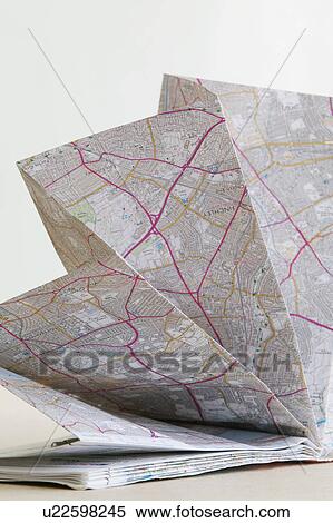 Stock Photography - Map folded in fan shape studio shot. Fotosearch