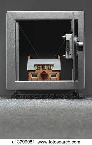 Model house in safe View Large Photo Image Stock Image - Model house in safe. Fotosearch