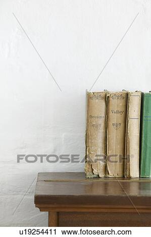 Old books on wooden chest View Large Photo Image Stock Image - Old books on wooden chest. Fotosearch