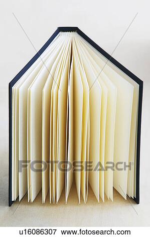 Open book elevated view studio shot View Large Photo Image Stock Photo - Open book elevated view studio shot. Fotosearch