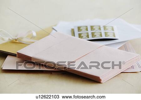 Paper stationery and stamps studio shot View Large Photo Image Stock Image - Paper stationery and stamps studio shot. Fotosearch