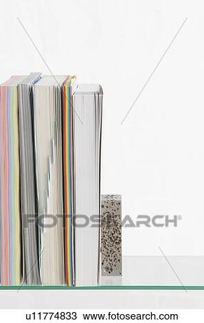 Paper stationery on glass shelf studio shot View Large Photo Image Stock Image - Paper stationery on glass shelf studio shot. Fotosearch