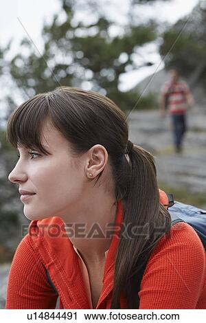 Pensive woman outdoors View Large Photo Image Stock Image - Pensive woman outdoors. Fotosearch