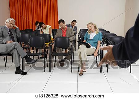 People sleeping during a seminar in conference room View Large Photo Image Stock Photography - People sleeping during a seminar in conference room. Fotosearch