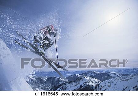 Person on skis jumping over slope View Large Photo Image Stock Photography - Person on skis jumping over slope. Fotosearch