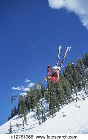 Person on skis jumping View Large Photo Image Stock Photo - Person on skis jumping. Fotosearch