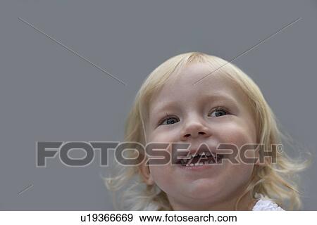 Portrait of young girl (3-4) laughing View Large Photo Image Stock Photo - Portrait of young girl (3-4) laughing. Fotosearch