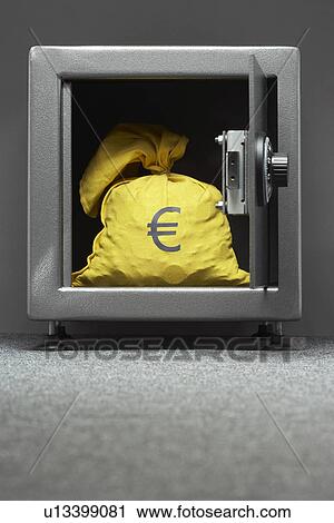 Stock Image - Sack with Euro symbol in safe. Fotosearch