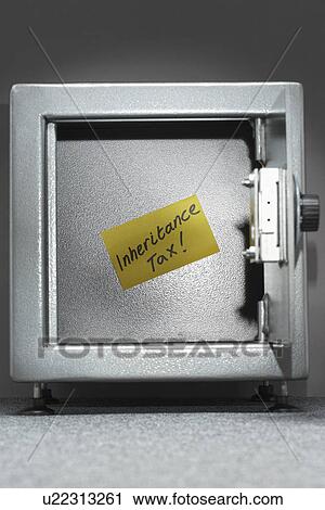 Stock Image - Safe with sticky note reading 'inheritance tax'. Fotosearch