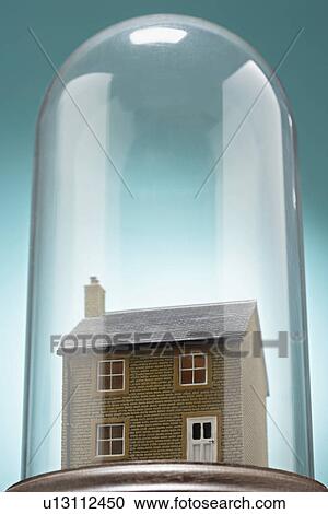 Small model house under glass cover View Large Photo Image Stock Image - Small model house under glass cover. Fotosearch