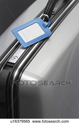 Suitcase with blank tag close-up View Large Photo Image Stock Photography - Suitcase with blank tag close-up. Fotosearch