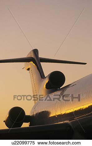 Tail fin of airplane sunse View Large Photo Image Stock Photography - Tail fin of airplane sunse. Fotosearch