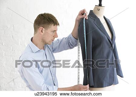 Tailor measuring jacket sleeve side view View Large Photo Image Stock Photography - Tailor measuring jacket sleeve side view. Fotosearch