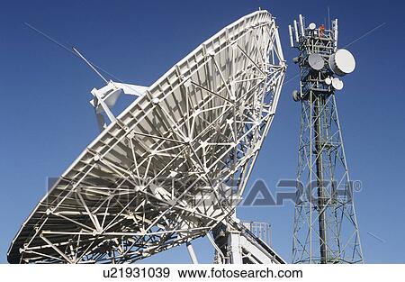 Telecommunications satellite dish and communications towers View Large Photo Image Stock Photo - Telecommunications satellite dish and communications towers. Fotosearch