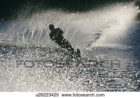 Water skier in action silhouette View Large Photo Image Stock Photography - Water skier in action silhouette. Fotosearch