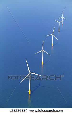 Wind turbines in sea View Large Photo Image Picture - Wind turbines in sea. Fotosearch