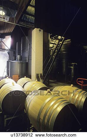Stock Image - Wine barrels in winery Yarra Valley Victoria Australia. Fotosearch
