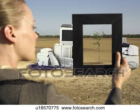 Stock Photography - Woman in Landfill. Fotosearch