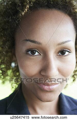 Woman smiling outdoors close-up portrait View Large Photo Image Stock Photography - Woman smiling outdoors close-up portrait. Fotosearch