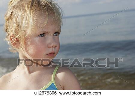 Young girl (3-4) at ocean View Large Photo Image Stock Photograph - Young girl (3-4) at ocean. Fotosearch