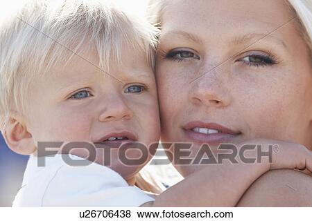 Young mother and son (1-2) close-up View Large Photo Image Stock Photo - Young mother and son (1-2) close-up. Fotosearch
